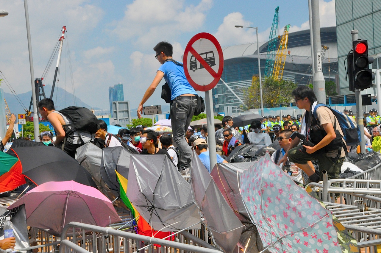 Early in the protest, reporters...