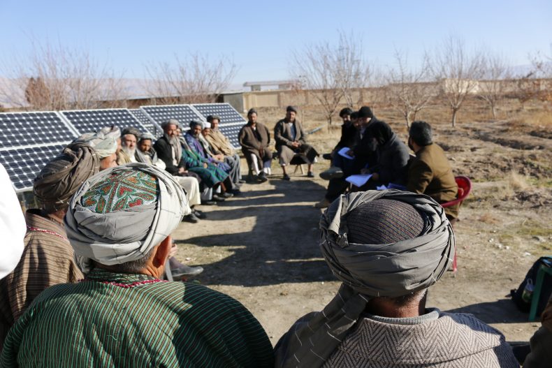 The Afghan Jirga and Shura, the Community Development Councils, assemble in a village to lead an informal justice based on the Sharia Law, including issues relating to violence against women. Image by Ritu Mahendru.