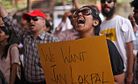 Indian Parliament Passes Anti-Graft Bill: Is Legislation the Answer to Corruption?
