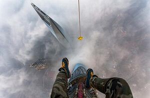 Don’t Look Down! Russian Thrill Seekers Illegally Climb Shanghai Tower
