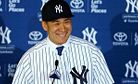 Tanaka Enters Training Camp to Much Fanfare, High Expectations