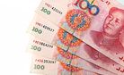 China Doubles Currency Trading Band