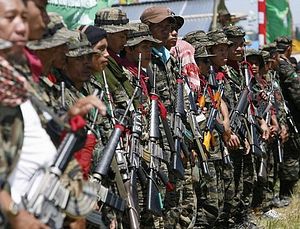 Philippine Muslim Rebels Begin Turning Over Weapons, Soldiers