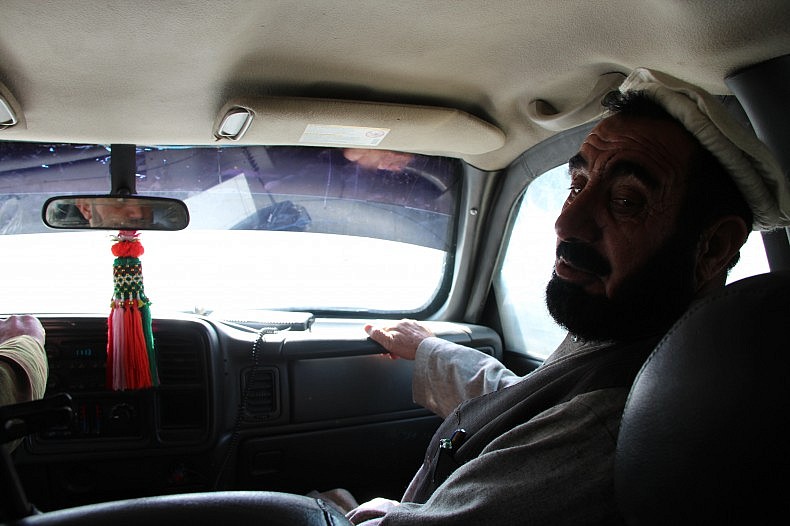 Achin District Governor Haji Ghalib Mujahid in the car. Photo by Silab Mangal.