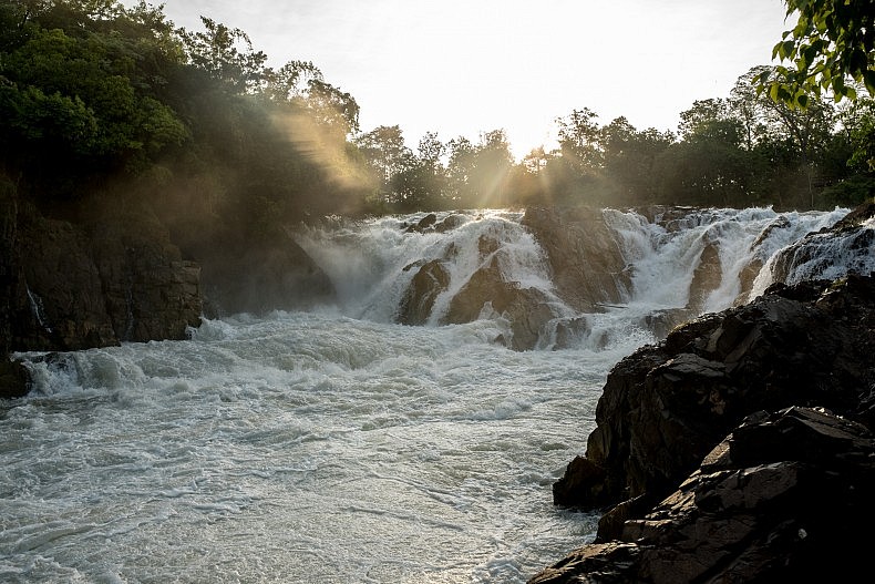 An elevated section of the Khone Phapheng waterfalls (Khone Falls). The Khone Falls stretch the breadth of the Mekong river and prevent it from acting as a commercially viable transportation route. Photo by Luc Forsyth.