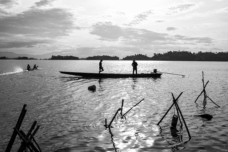 Fishermen on the Nam Ngum dam's reservoir. Photo by Gareth Bright.