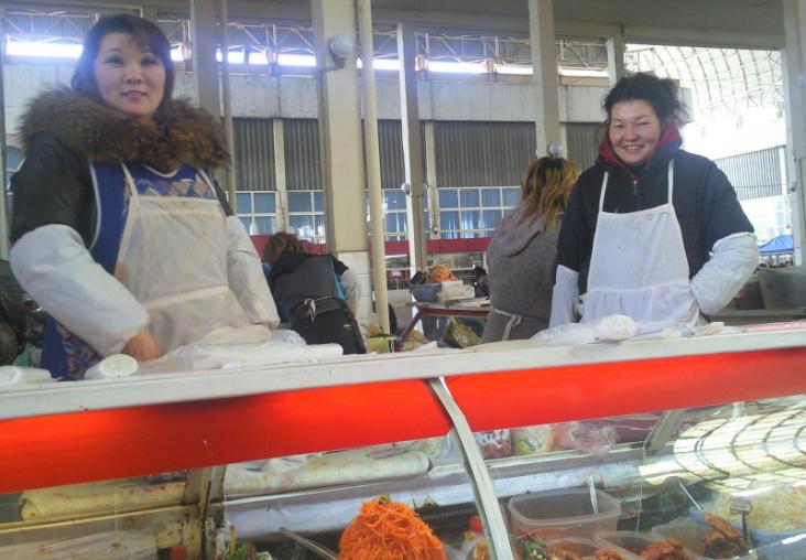 Local Korean sellers at a typical Korean salad stand in Tashkent. Courtesy of Victoria Kim.