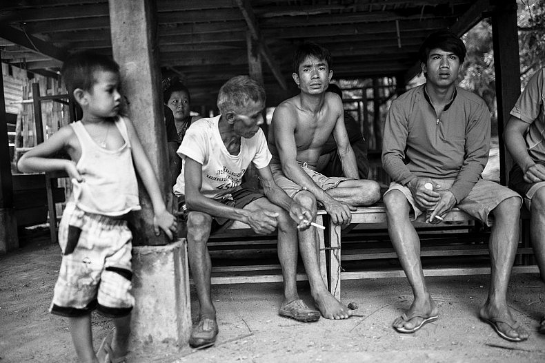 Group of men living in the village of Khoc Kham. Photo by Gareth Bright.