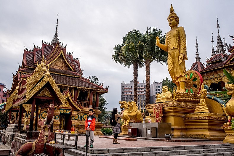 Xishuangbanna, China--with sites like this large Buddhist temple--is a popular desitnation for Chinese vacationers, but there were few foreign tourists. Photo by Luc Forsyth.