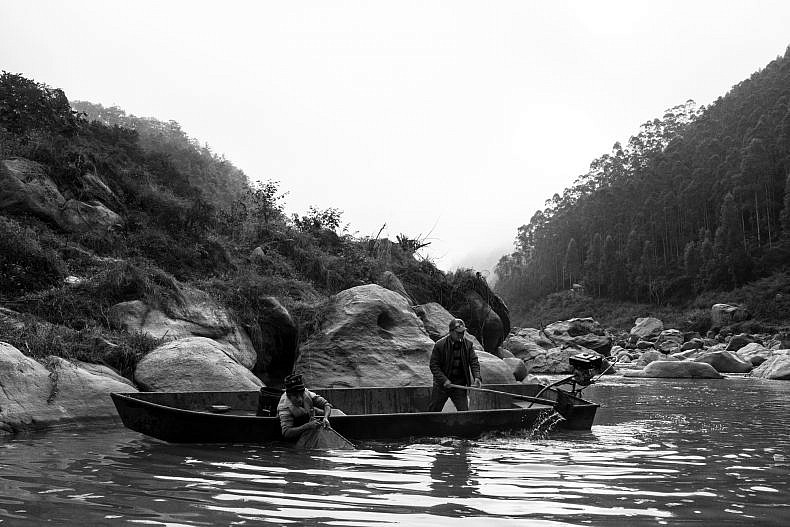 Fishermen on a tributary of the Lancang (Mekong) in Yunnan, China. Photo by Gareth Bright.