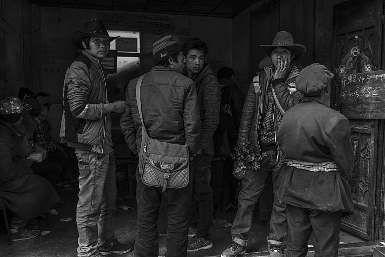 Men in the village of Xialuoga. Photo by Gareth Bright.