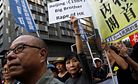 China Bars Pro-Independence Legislators in Hong Kong