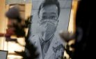 China Exonerates Doctor Reprimanded for Warning About Virus