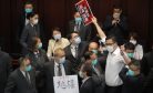Lawmakers Ejected in Scuffles at Hong Kong’s Legislature