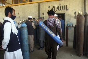 Long-Shut Factory Helps COVID-Struck Afghans Breathe Free