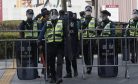 South Korea Baffled by Stop-and-Search, Police Bus Walls During Protests