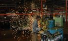 Vandalized iPhone Plant Highlights India’s Torturous Economic Path