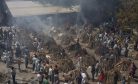 India’s COVID-19 Death Toll Tops 400,000; Experts Say It&#8217;s Higher