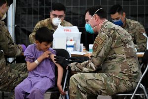 US Resumes Afghan Refugee Flights After Measles Shots