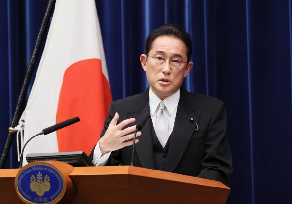 Japan PM purges Cabinet after support falls over church ties