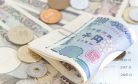Japan OKs Record $317 Billion Extra Budget for COVID, Economy