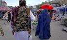 Taliban Divisions Deepen as Afghan Women Defy Veil Edict
