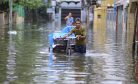 Officials Try to Deliver Aid to Flooded South Asia Villages