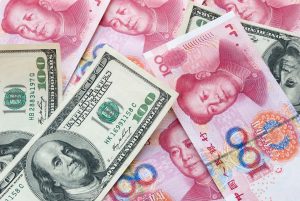 Is France Backing China’s Currency Against the US Dollar?