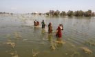 Aid Pours into Pakistan; Deaths From Floods Cross 1,200 Mark