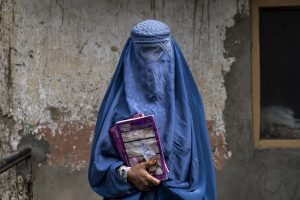 In Afghanistan, Women Give Up Freedom to Stay Alive