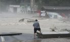 Floods Around Beijing Kill At Least 20, Leave 27 Missing as Thousands Evacuated