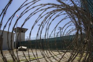 Should a Man Face Trial Alone at Guantanamo Bay While His 2 Co-Accused Return Home?