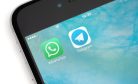 How the Ban on WhatsApp, Telegram Calls Affects Central Asian Migrants in Russia